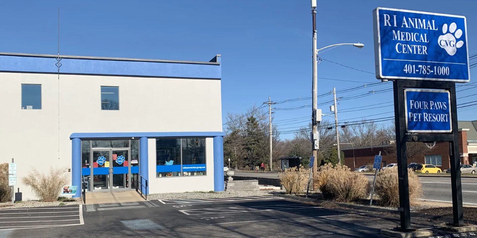 Entrance to Rhode Island Animal Medical Center and the Four Paws Pet Resort sign on Warwick Avenue
